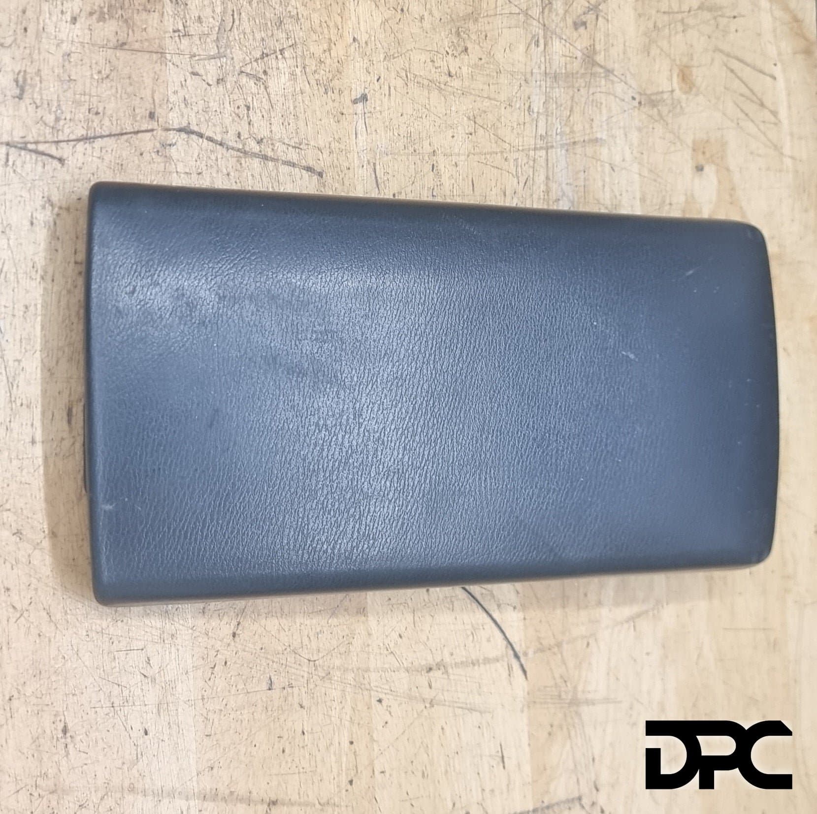 R33 console lid - used - 96920-15U00. OEM Center Armrest Cover photo 1 of 1
